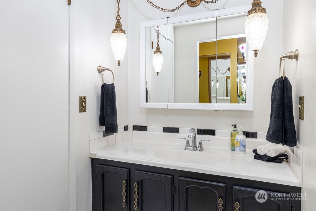 22422 4th Avenue Southeast Bothell, WA 98021 - Photo 17 of 39 a bathroom with a sink and a mirror