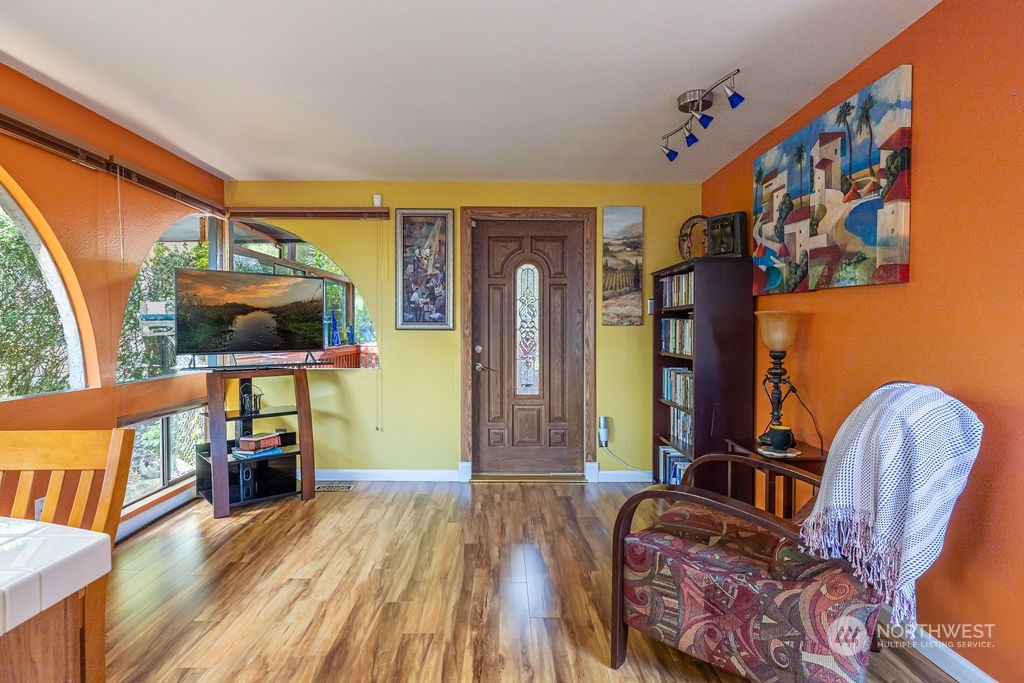 22422 4th Avenue Southeast Bothell, WA 98021 - Photo 26 of 39 a living room with furniture and a flat screen tv