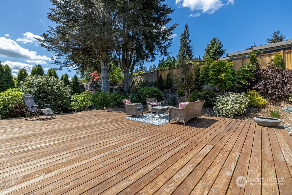 22422 4th Avenue Southeast Bothell, WA 98021 - Photo 33 of 39 a view of a backyard with sitting area