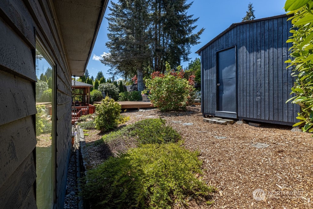 22422 4th Avenue Southeast Bothell, WA 98021 - Photo 39 of 39 a backyard of a house with lots of green space