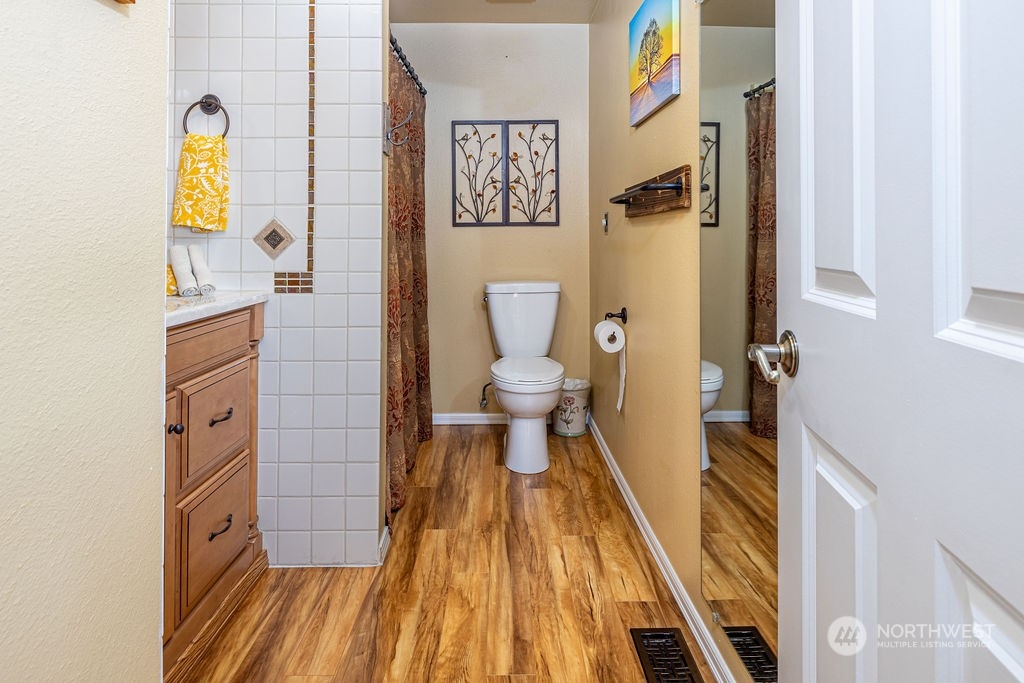 22422 4th Avenue Southeast Bothell, WA 98021 - Photo 10 of 39 a bathroom with a toilet and a shower