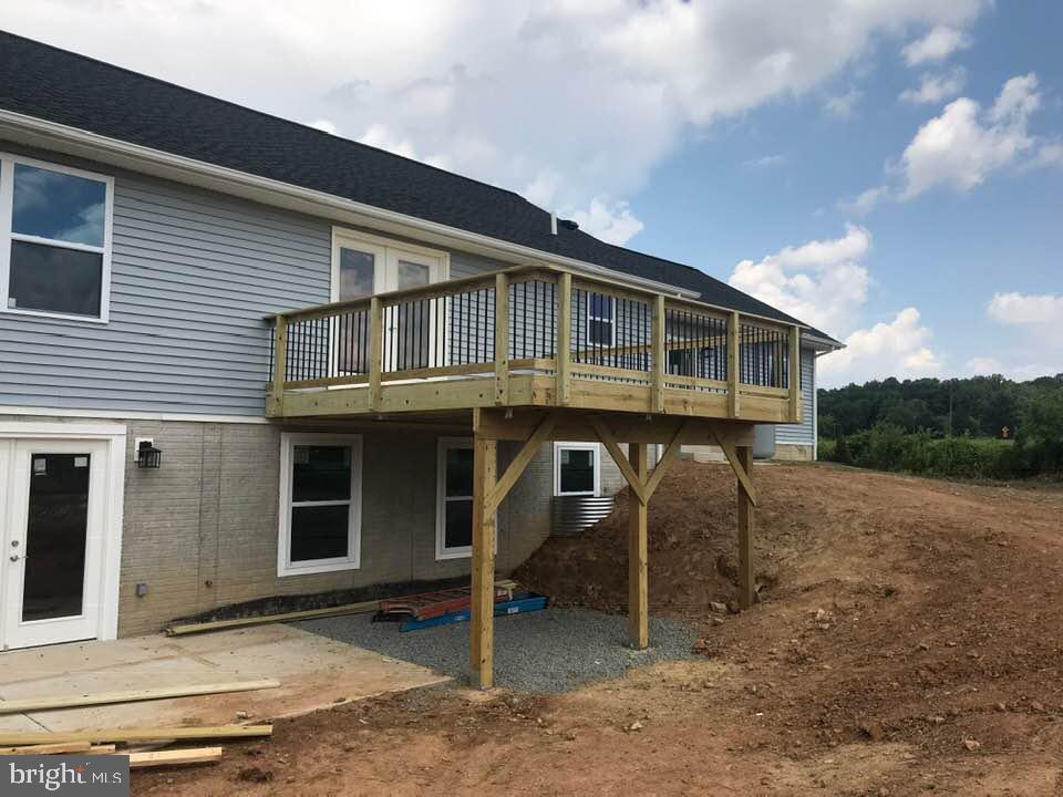 16377 Stevensburg Road Brandy Station, VA 22714 - Photo 21 of 35 Concrete patio off basement doors