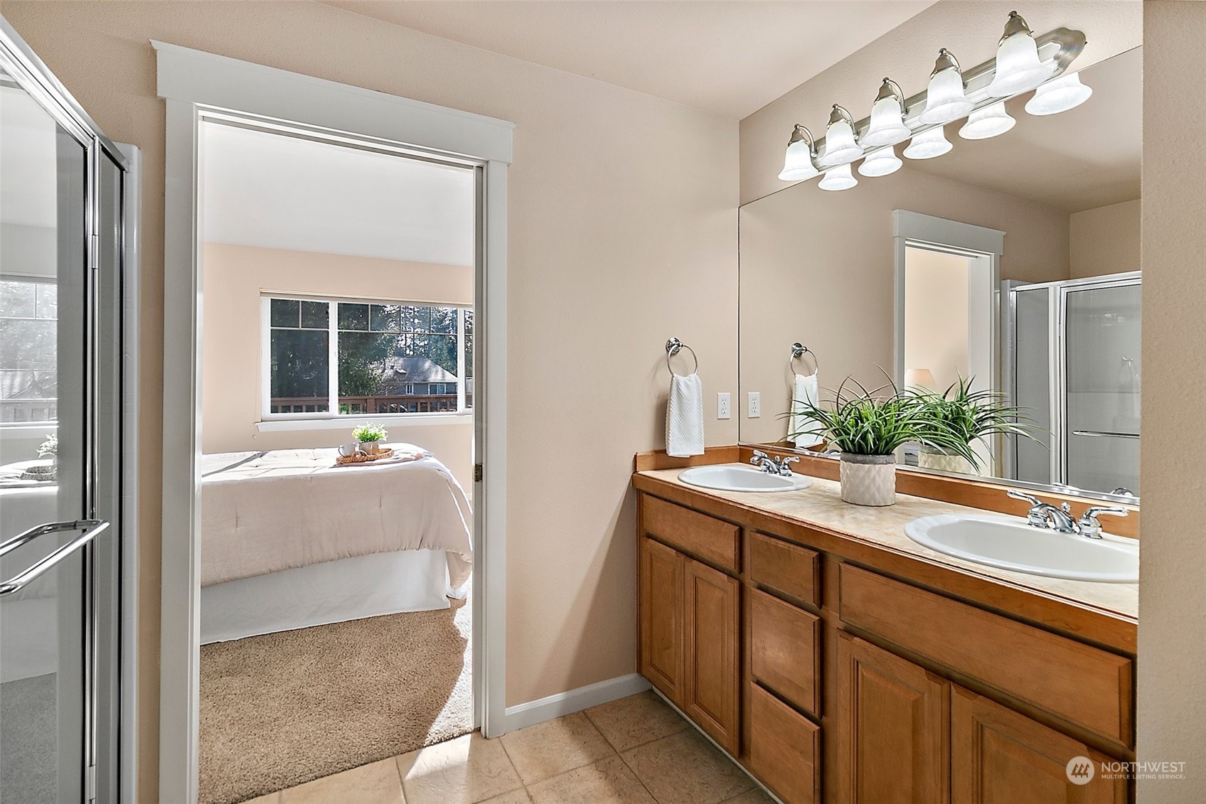 91 East Soderberg Road, Unit A2 Allyn, WA 98524 - Photo 21 of 32 a bathroom with a sink and a mirror