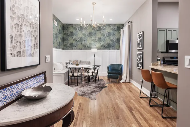 a living room with furniture and a table