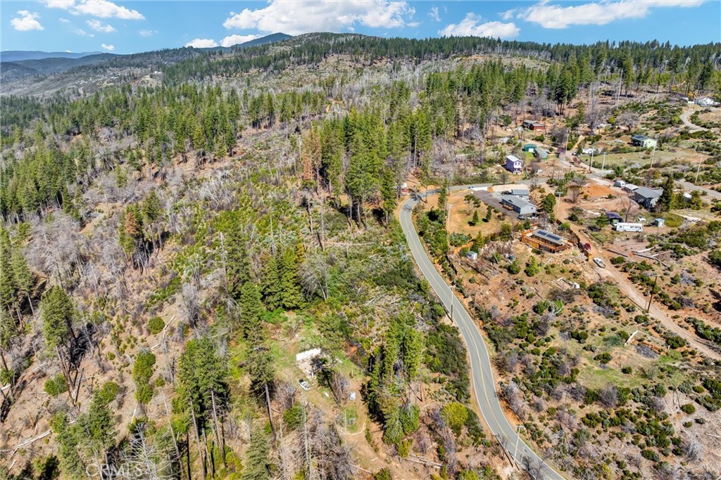 12061 Gifford Springs Road Cobb, CA 95426 - Photo 10 of 16 a view of a lake with an outdoor space