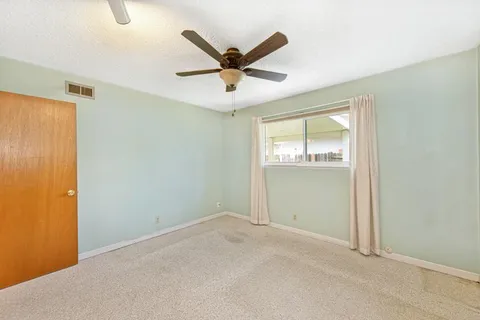 an a ceiling fan in a room