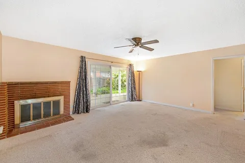 a view of a livingroom with a fireplace