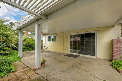 a view of entrance gate of a house