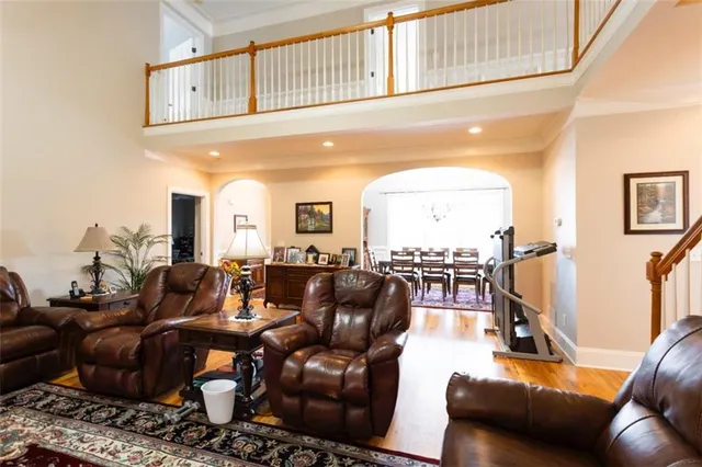 a kitchen with stainless steel appliances granite countertop a stove refrigerator and cabinets