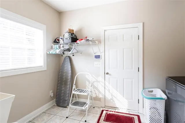 a bed room with a bed and a television