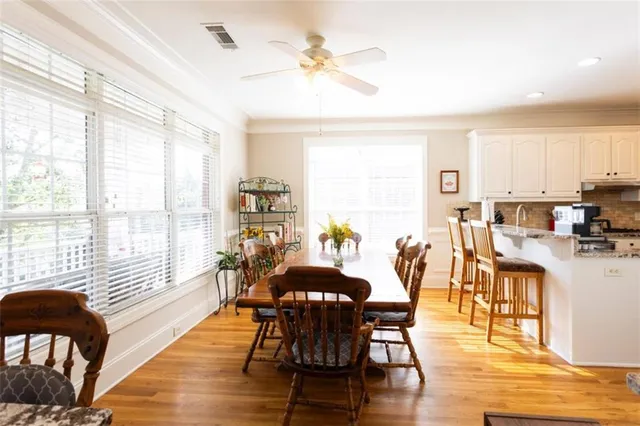 a bathroom with a bathtub and a sink
