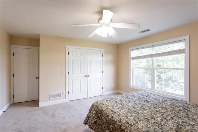 a outdoor living space with furniture and a potted plant