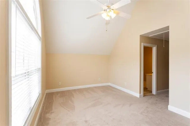 an aerial view of a residential houses with outdoor space