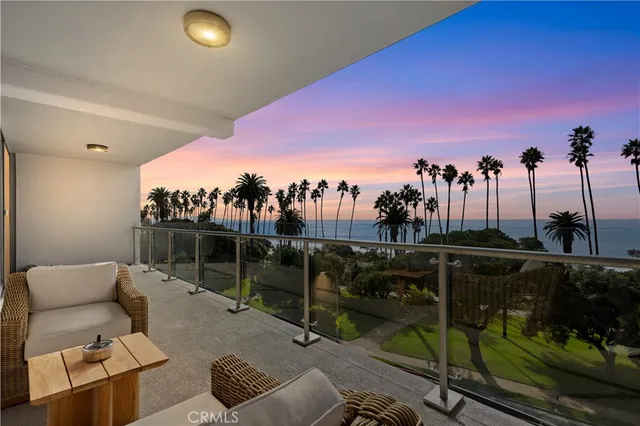 a view of a terrace with sitting area
