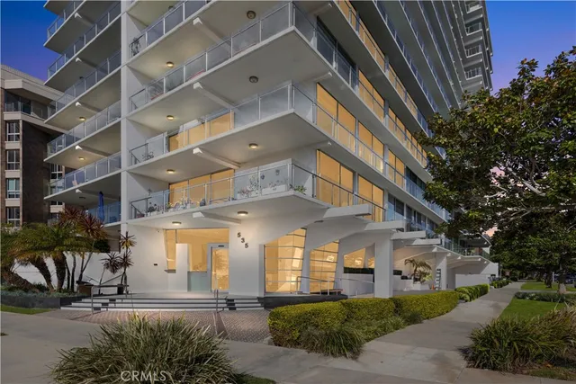 a view of a building with a yard