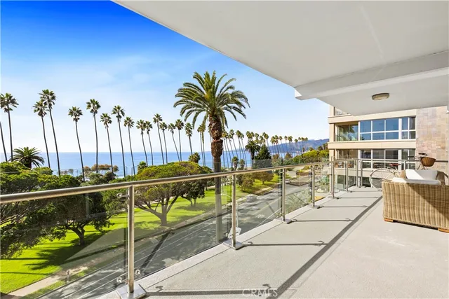 a view of a swimming pool with a lounge chair