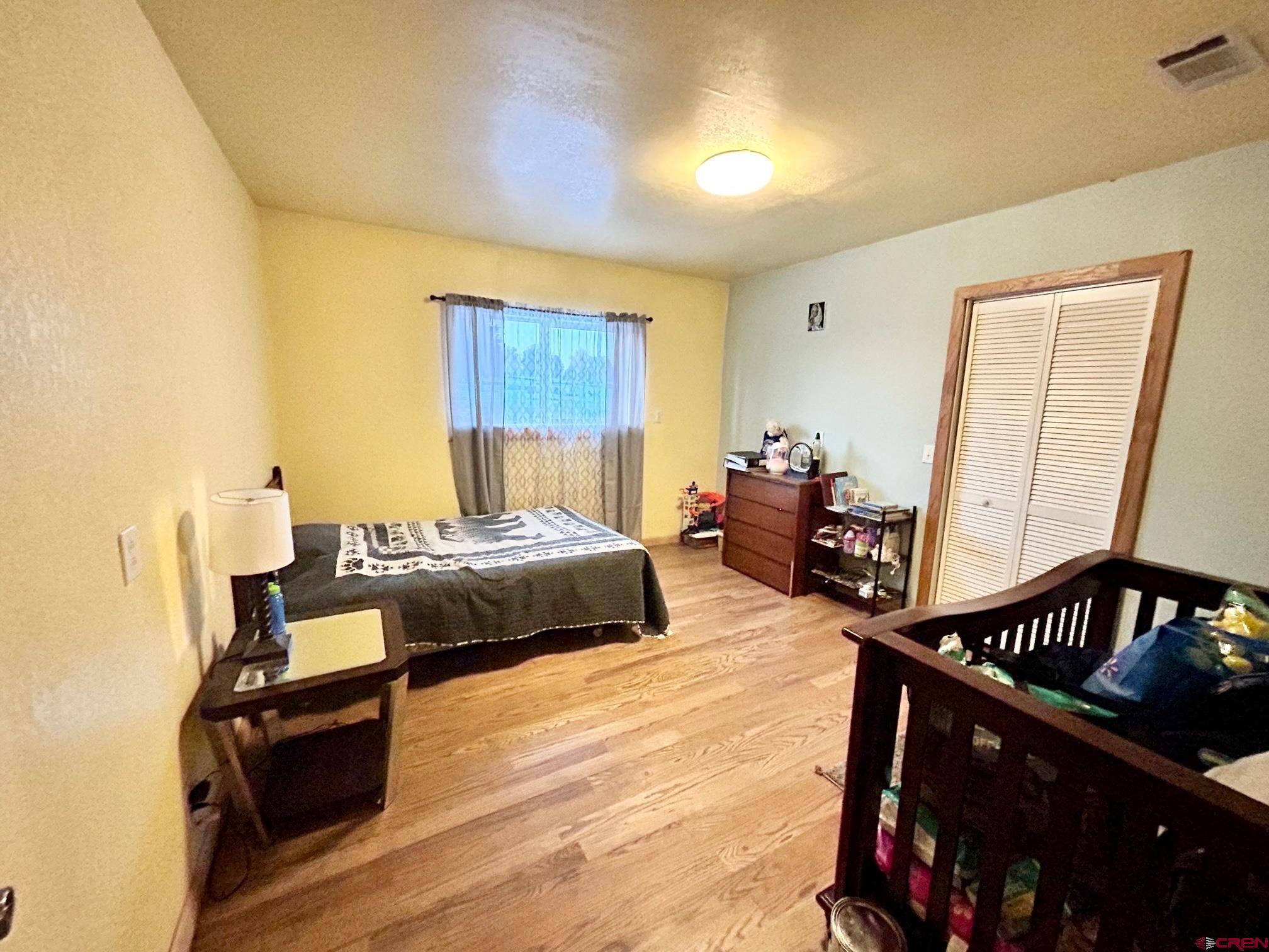 175 County Road Egnar, CO 81325 - Photo 22 of 35 a bedroom with bed and window