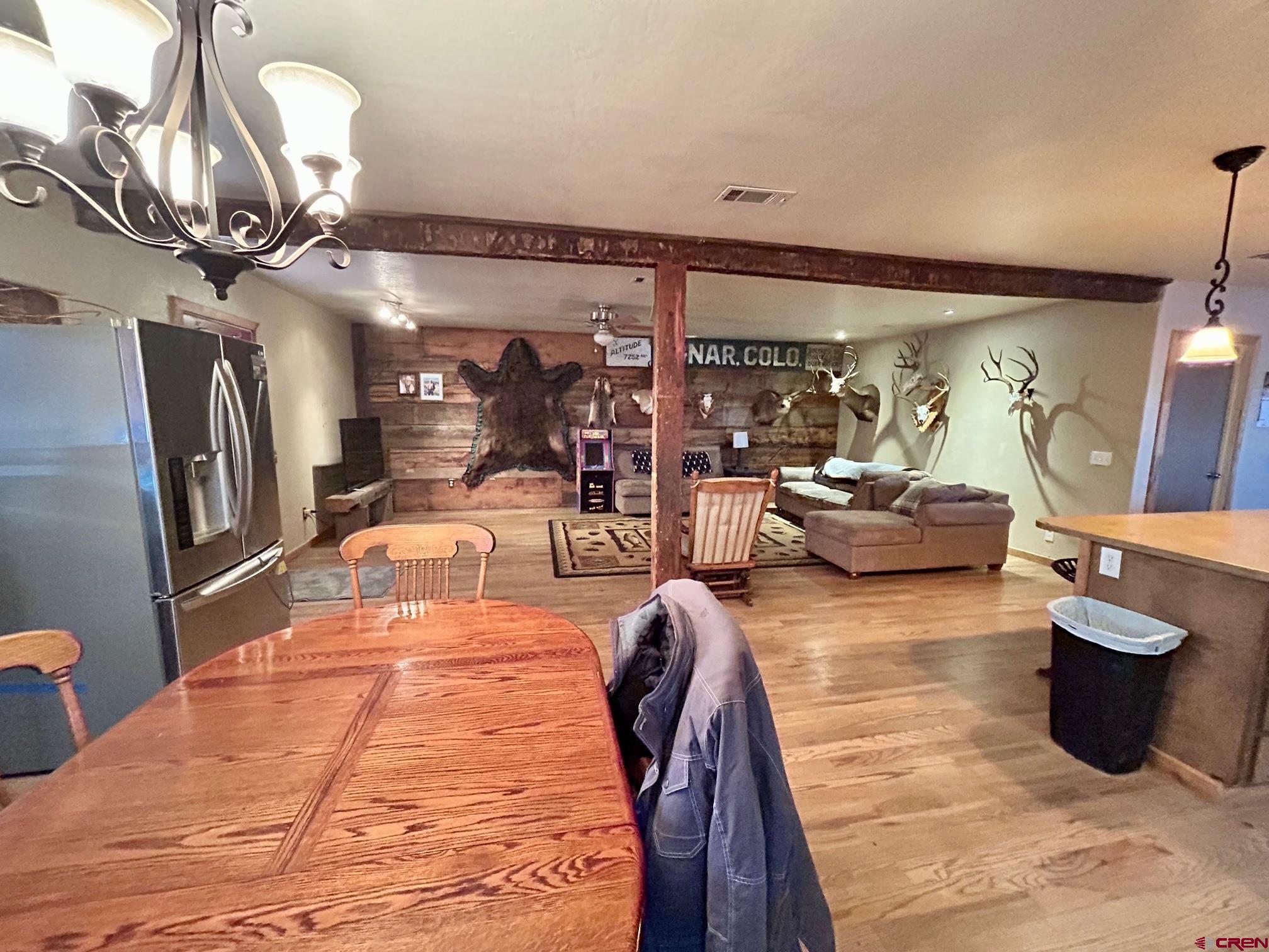 175 County Road Egnar, CO 81325 - Photo 5 of 35 a lobby with furniture and chandelier