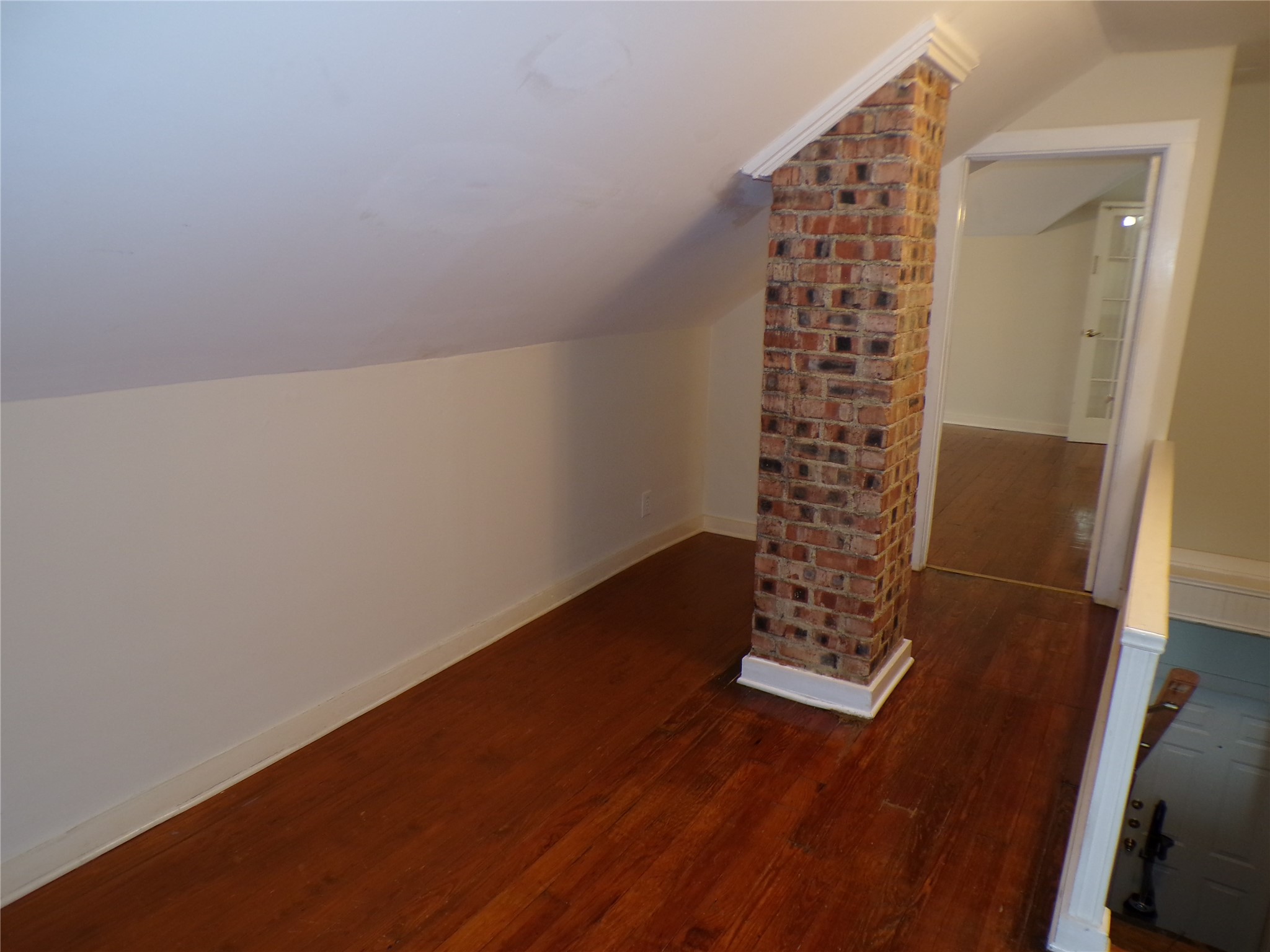 3416 Morrison Street, Unit 9 Houston, TX 77009 - Photo 25 of 38 Exposed brick provides special look...space leads to the main living area.