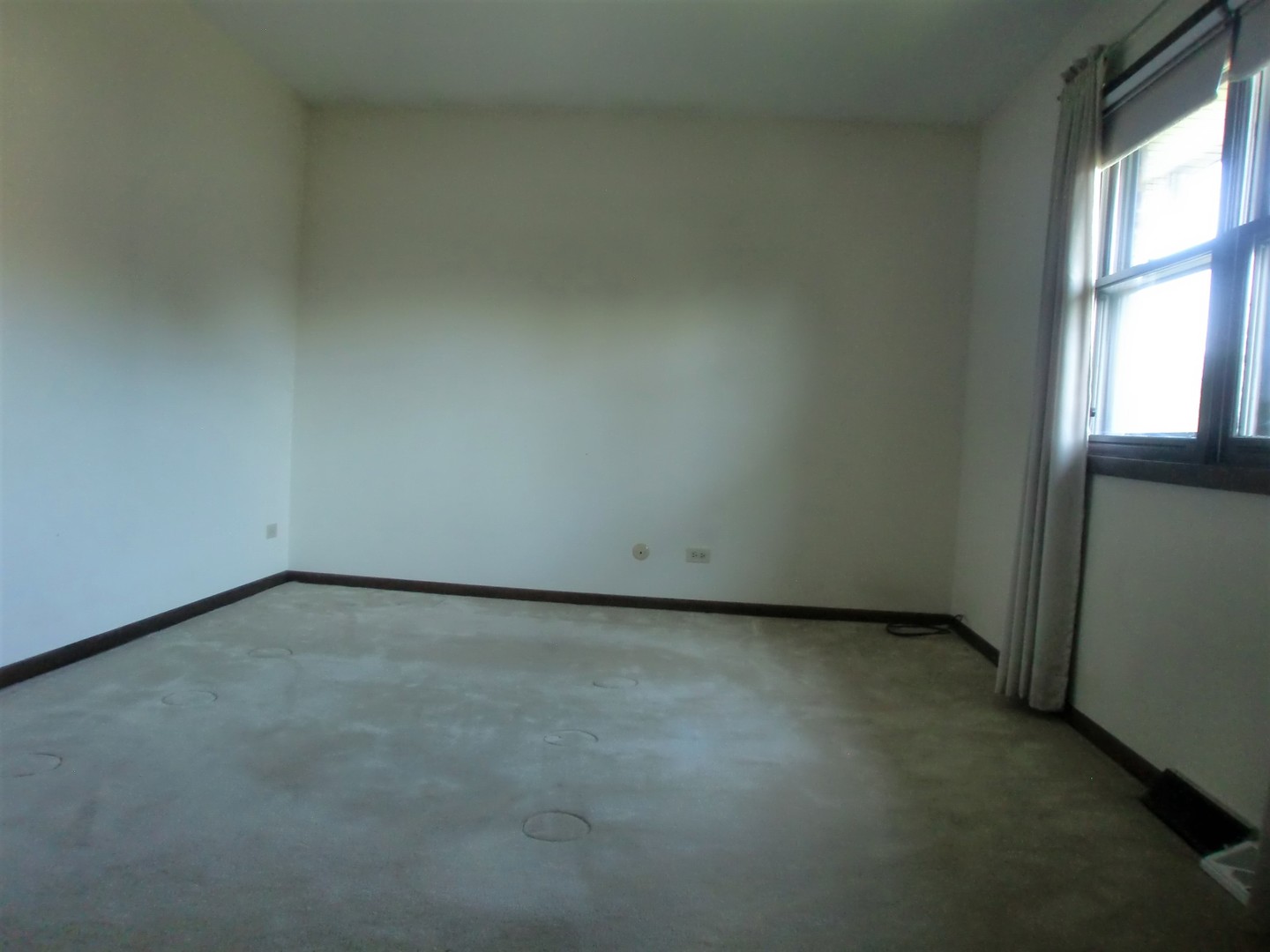 701 Ridge Court Schaumburg, IL 60193 - Photo 18 of 24 a view of an empty room and a window