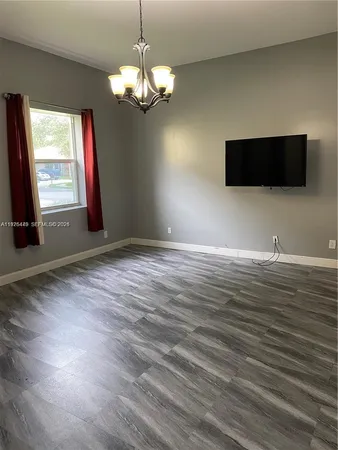 a view of a livingroom with a window