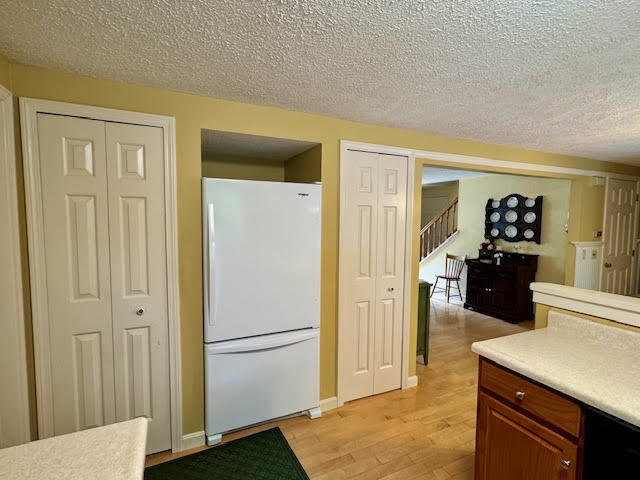 111 Evergreen Drive, Unit 111 Waterville, ME 04901 - Photo 9 of 40 View from kitchen to living room