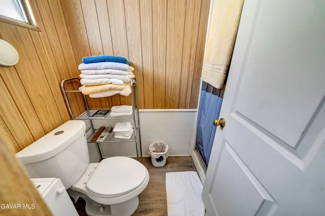 a bathroom with a toilet and a sink