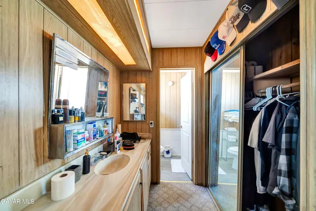 a very nice looking room with a large window and a couch