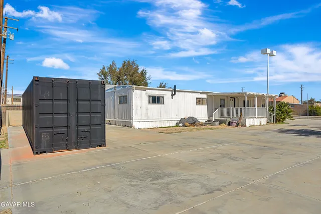 a view of a house with a garage