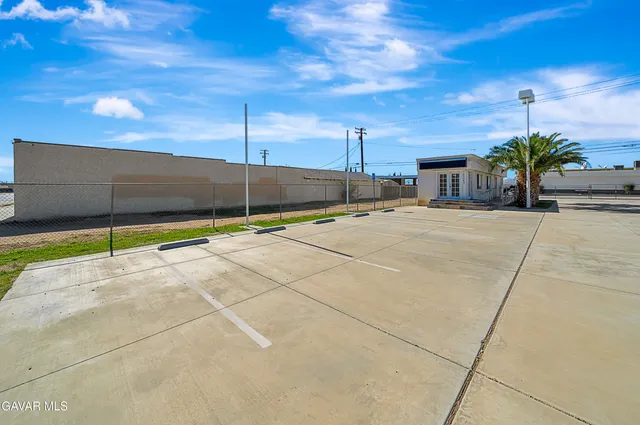 a view of an outdoor space and tennis court