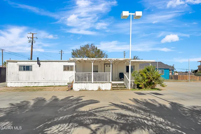 a view of a house with a patio