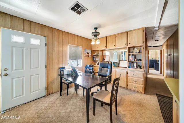 a view of a dining room with furniture