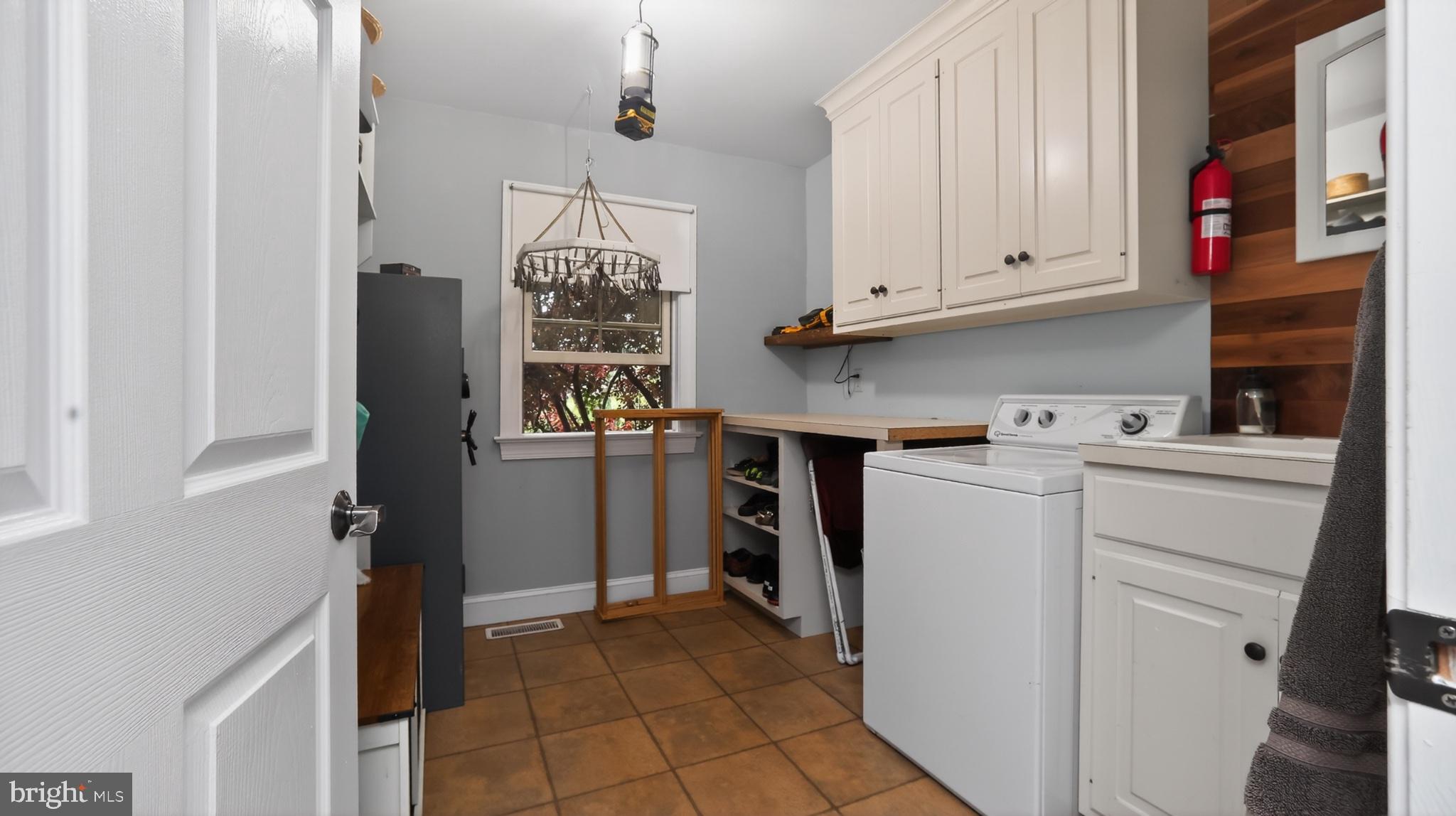 5325 Hammond Road New Holland, PA 17557 - Photo 6 of 73 Charming laundry nook with modern flair.