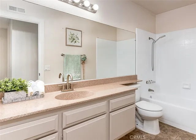 a workspace with furniture and a window