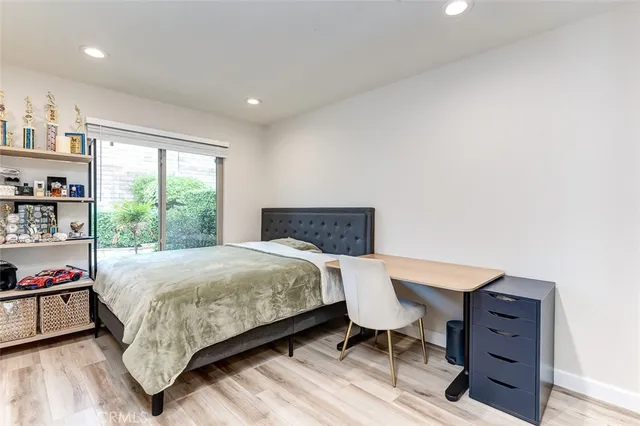 a view of a livingroom with an empty space and a fireplace