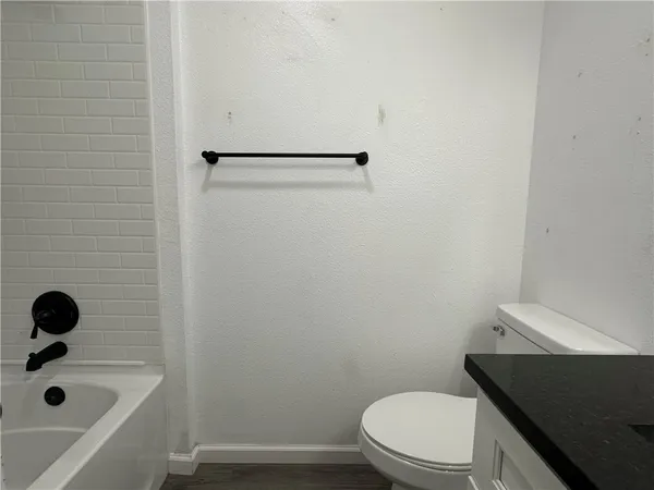 a bathroom with a sink and a toilet