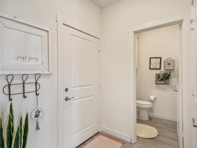 a kitchen with a stove top oven sink and cabinets