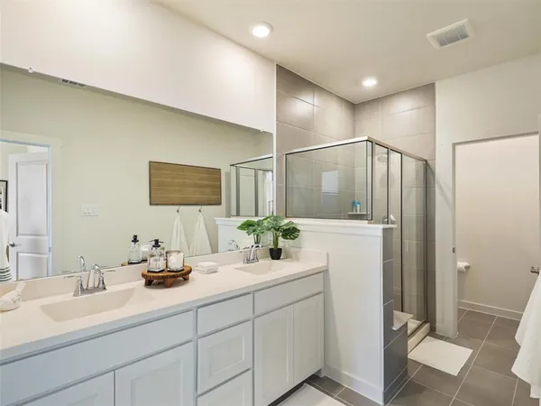 a bedroom with a bed and a table in it