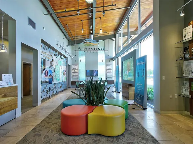 a view of a house with a yard and plants