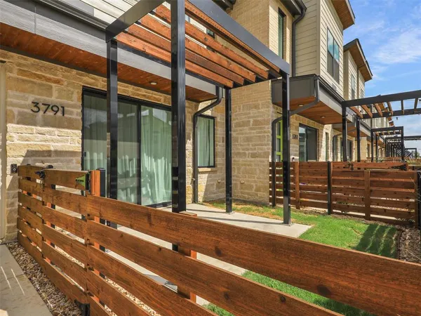 a view of a brick building with a large windows