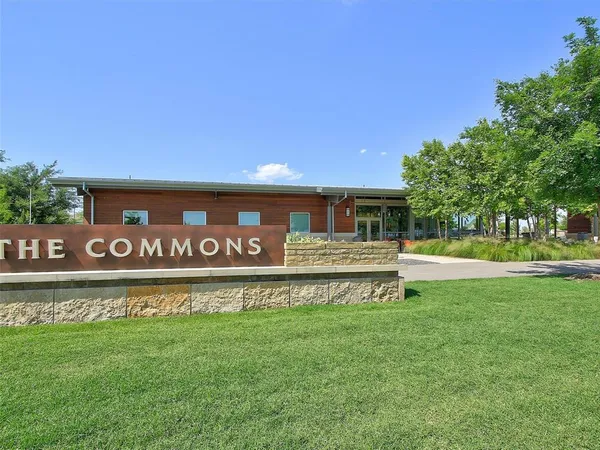 a view of a park and entertaining space