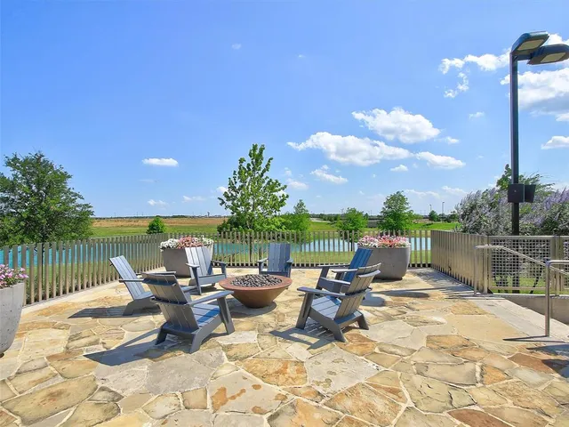 a view of a green field with clear sky