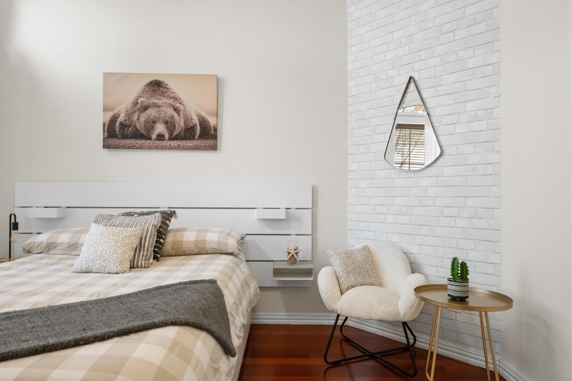 12201 Barrel Bend Austin, TX 78748 - Photo 25 of 35 Bedroom featuring dark wood-style floors and baseboards
