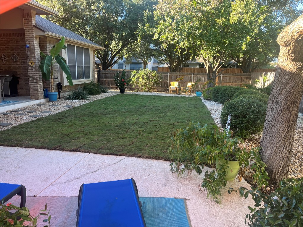 12201 Barrel Bend Austin, TX 78748 - Photo 30 of 35 View of yard with a patio area