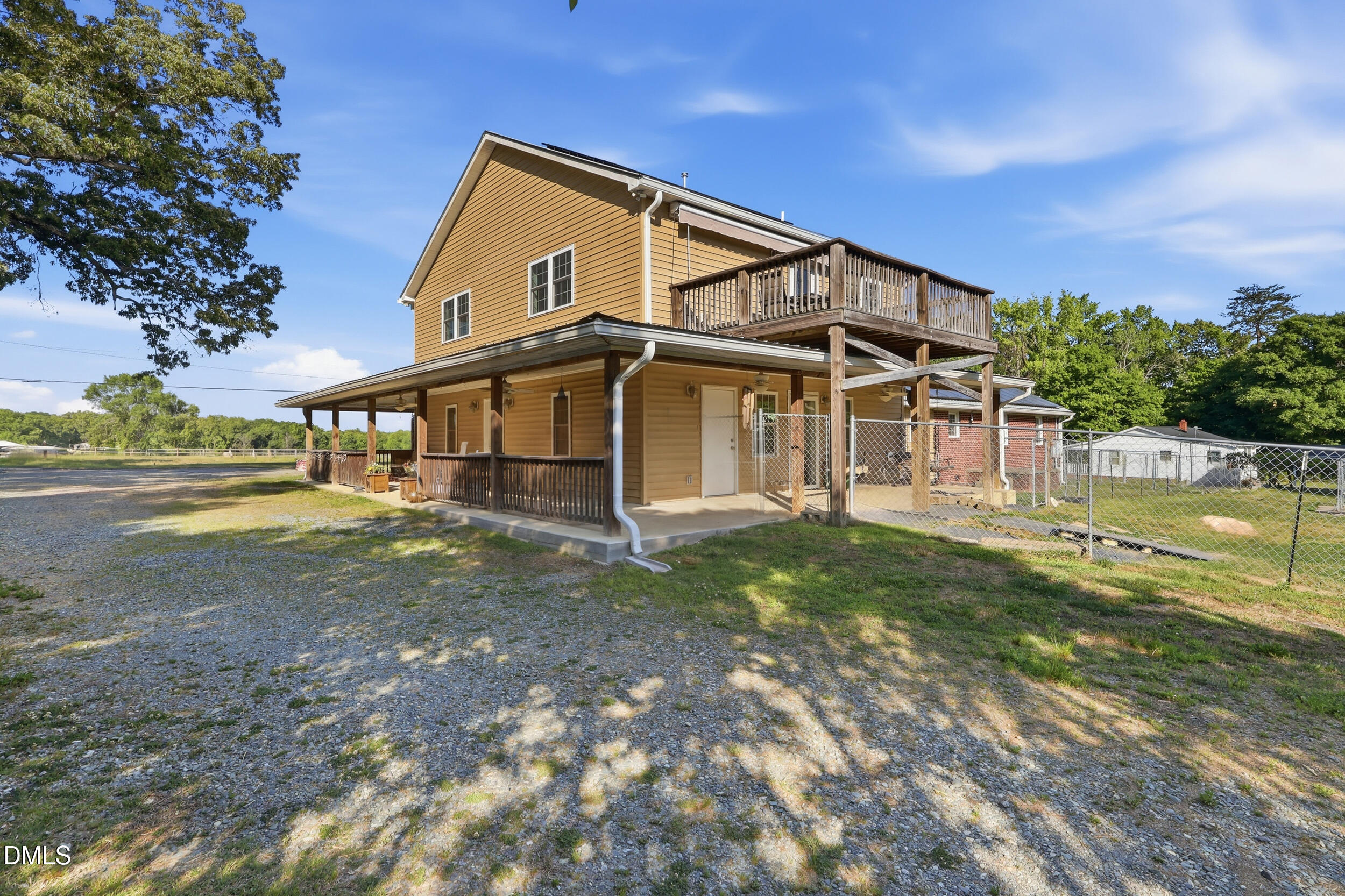 2631 South Jim Minor Road Haw River, NC 27258 - Photo 42 of 62 a view of a house with a yard