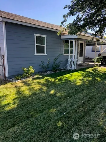 a view of a house with swimming pool
