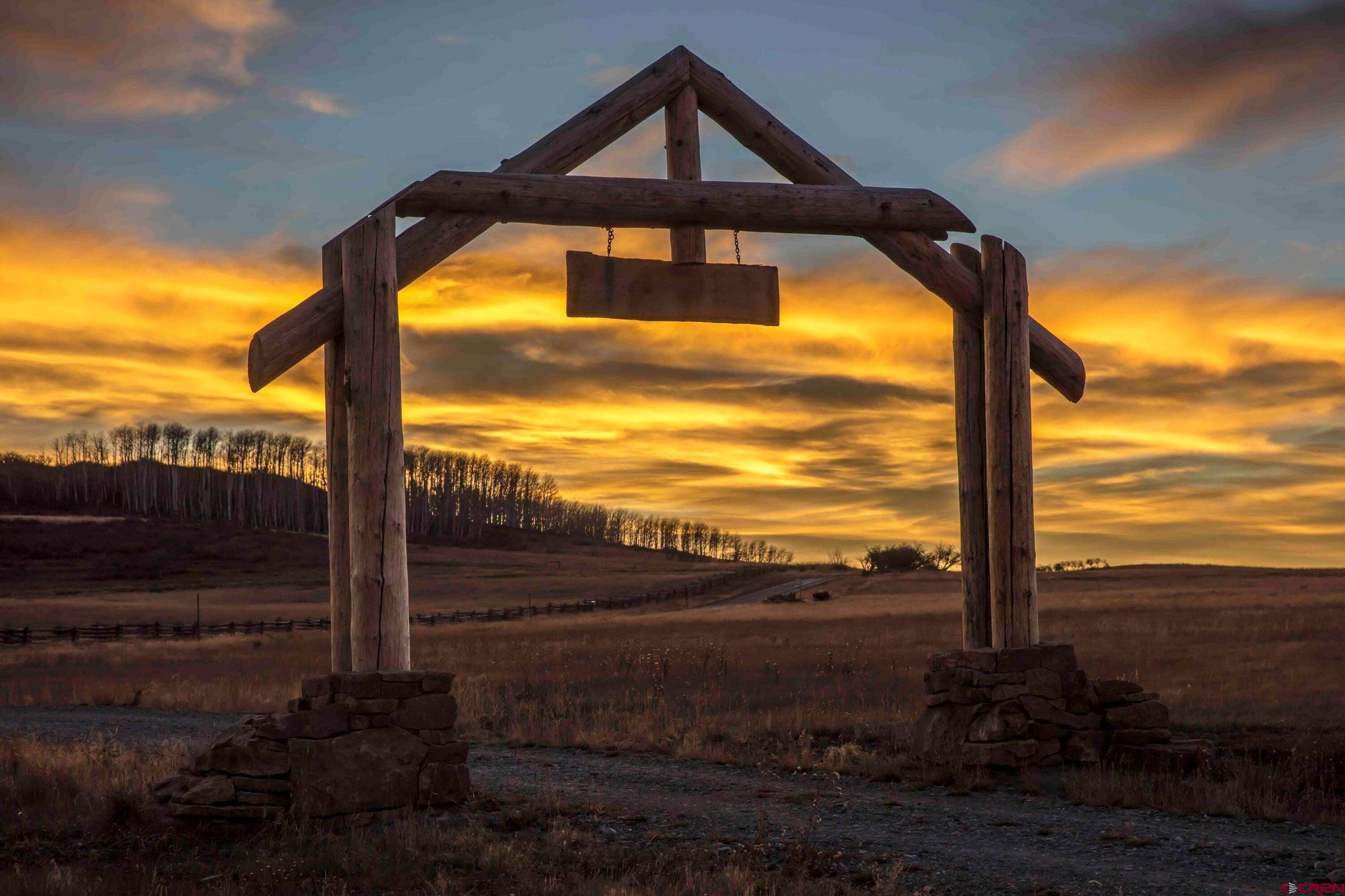 9949-county Rd 58p Placerville, CO 81430 - Photo 22 of 23 a view of a yard with an ocean view