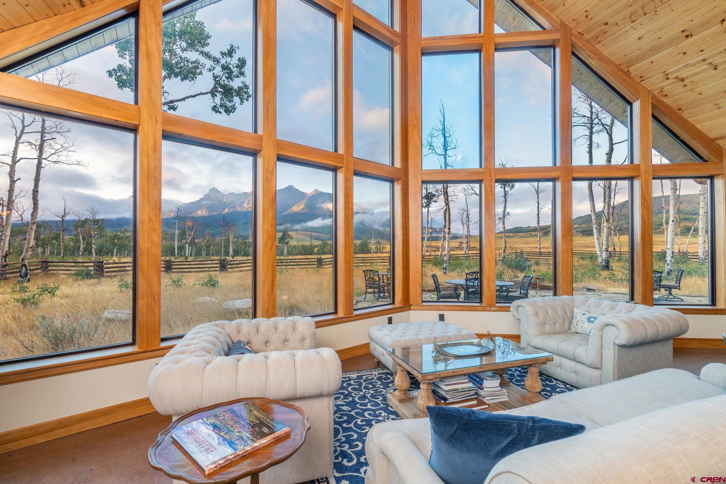 9949-county Rd 58p Placerville, CO 81430 - Photo 4 of 23 a living room with furniture and a large window