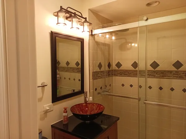 a kitchen with a sink stove and refrigerator