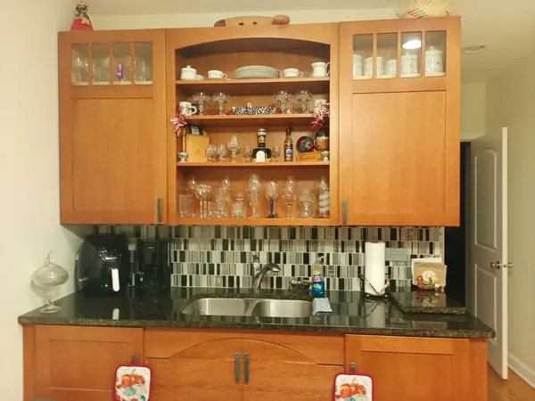 a kitchen with a sink and cabinets
